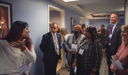 Graduate Practicum Student, Nisha Umesh, leads a tour of the new clinic